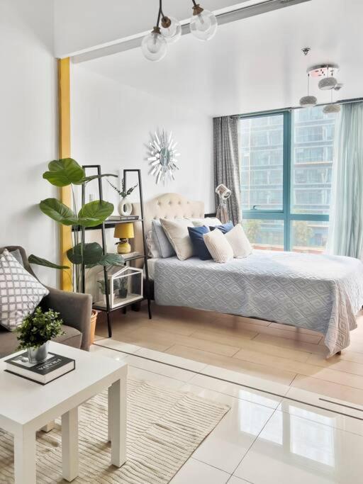טאגיג One Uptown Residences Bgc מראה חיצוני תמונה