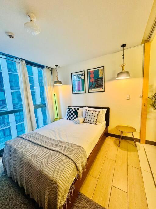 טאגיג One Uptown Residences Bgc מראה חיצוני תמונה