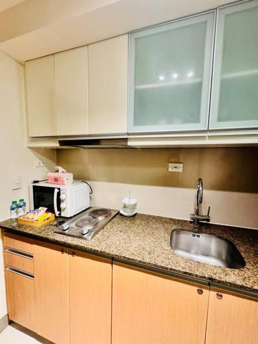 טאגיג One Uptown Residences Bgc מראה חיצוני תמונה