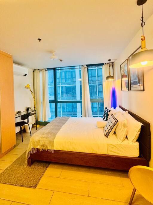 טאגיג One Uptown Residences Bgc מראה חיצוני תמונה