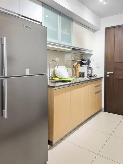 טאגיג One Uptown Residences Bgc מראה חיצוני תמונה