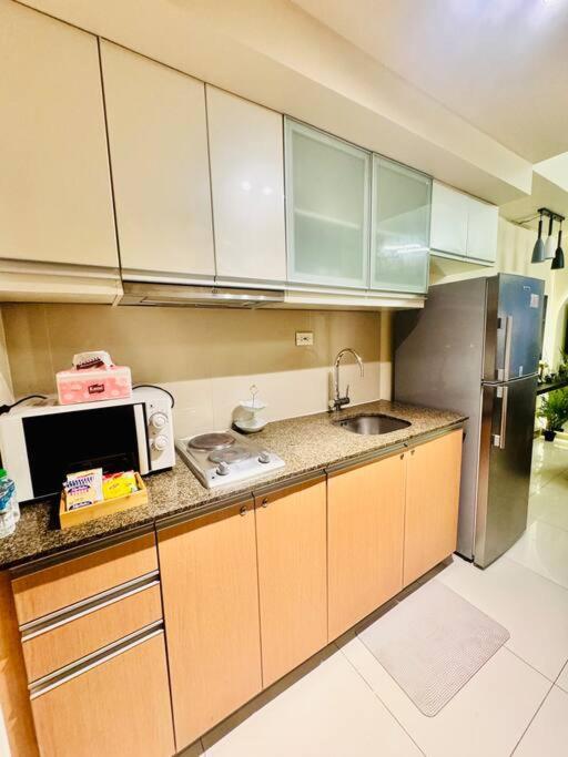 טאגיג One Uptown Residences Bgc מראה חיצוני תמונה
