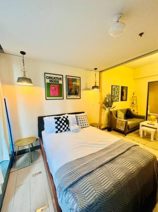 טאגיג One Uptown Residences Bgc מראה חיצוני תמונה