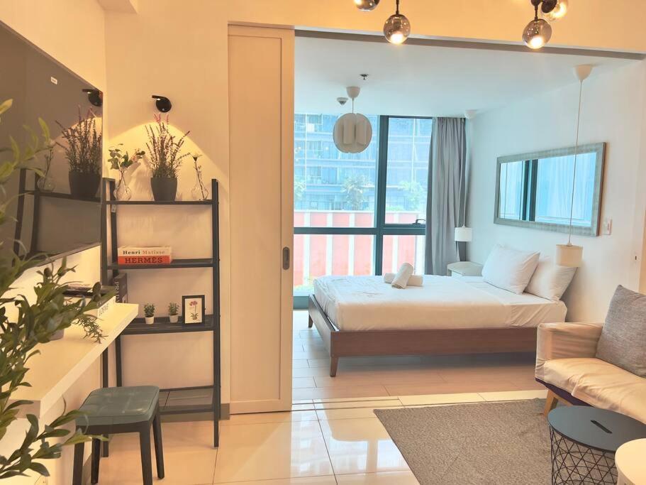 טאגיג One Uptown Residences Bgc מראה חיצוני תמונה