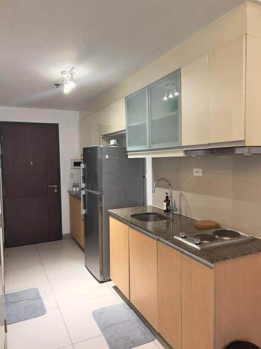 טאגיג One Uptown Residences Bgc מראה חיצוני תמונה