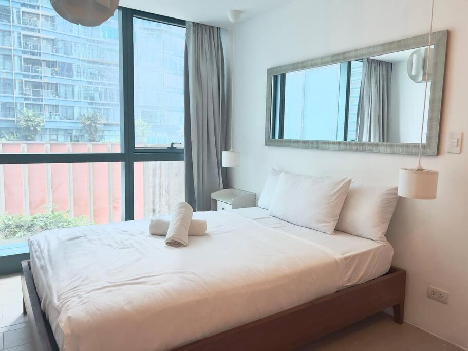 טאגיג One Uptown Residences Bgc מראה חיצוני תמונה